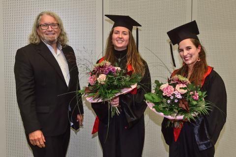 Dean with the best Bachelor Graduate and the best Master Graduate